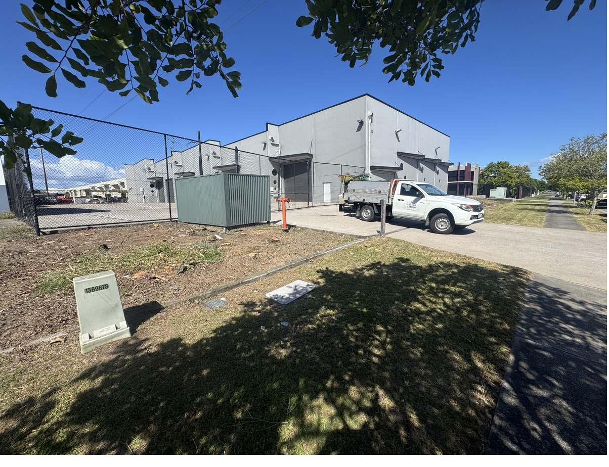 Hatton Garden ute and equipment on site at a commercial property in Warana