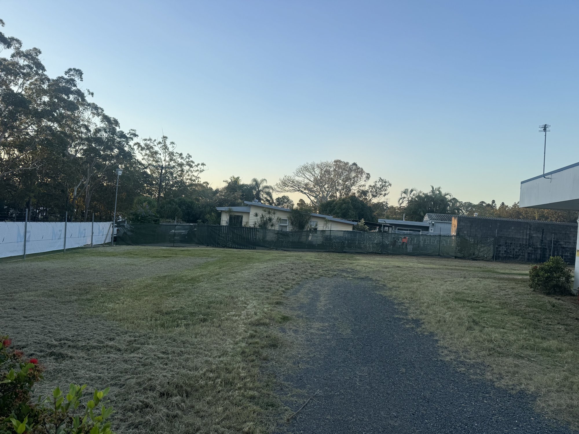 The same vacant commercial lot slashed and tidy the same afternoon